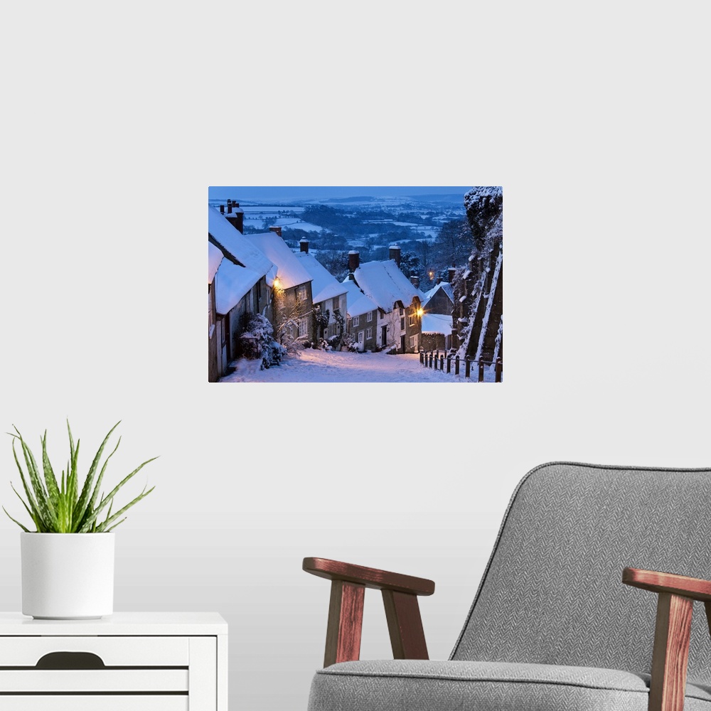 A modern room featuring Cottages on Gold Hill in winter snow, Shaftesbury, Dorset, England
