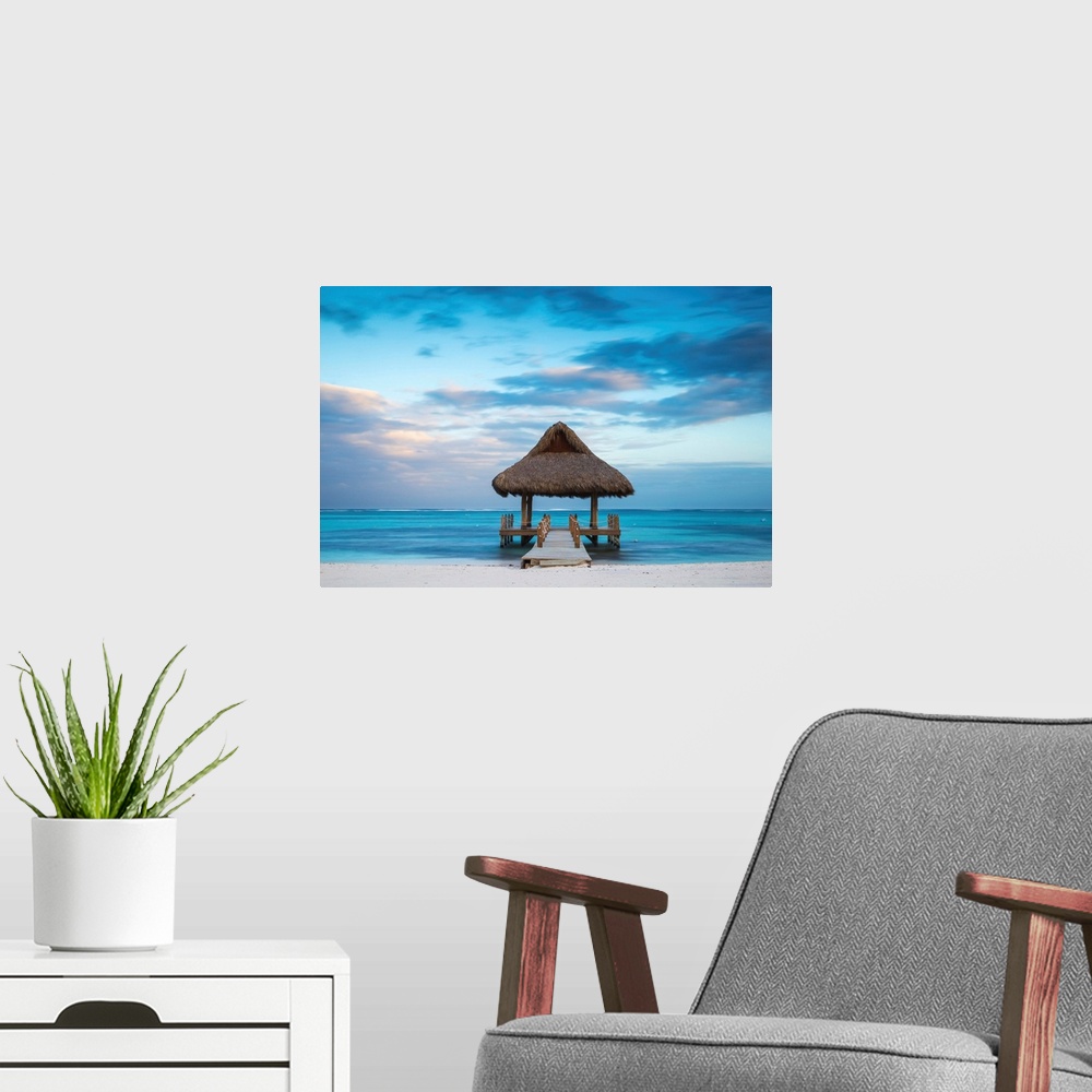 A modern room featuring Dominican Republic, Punta Cana, Playa Blanca, Wooden pier with thatched hut.