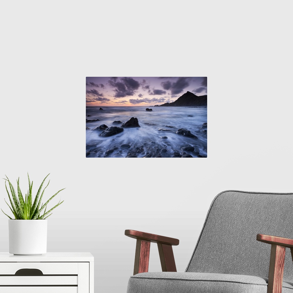A modern room featuring Dusk on the rocky shores of Speke's Mill Mouth in North Devon, England. Summer