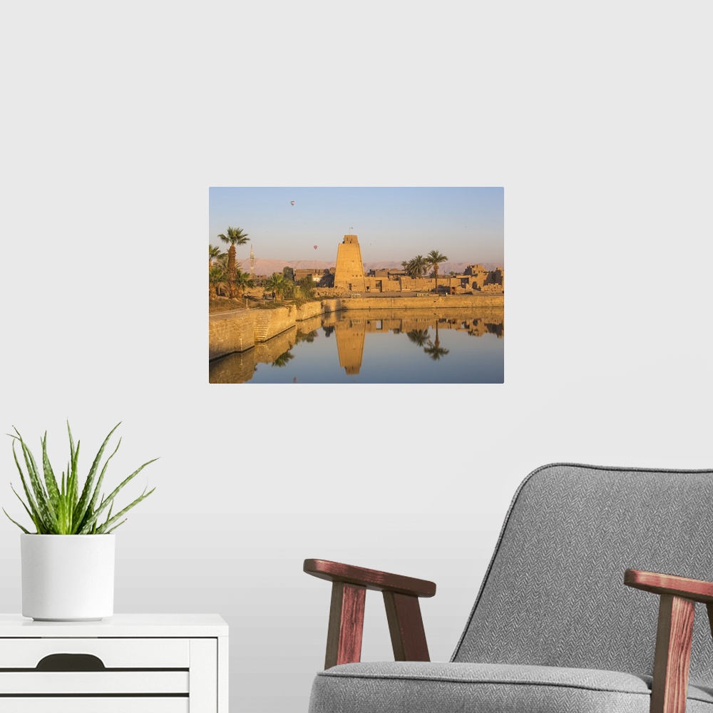 A modern room featuring Egypt, Luxor, Karnak Temple, Hot air balloons rise over the Sacred Lake