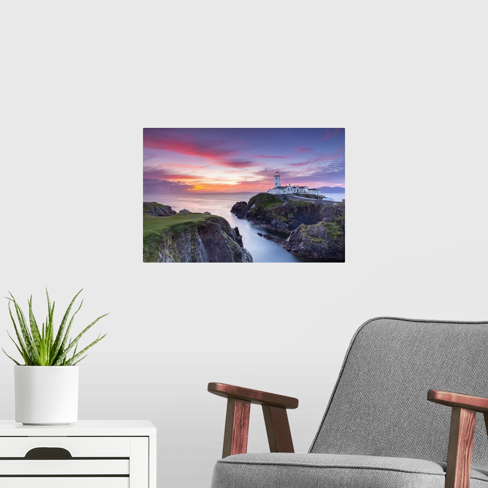 A modern room featuring Fanad Head lighthouse at sunrise, County Donegal, Ulster region, Ireland.