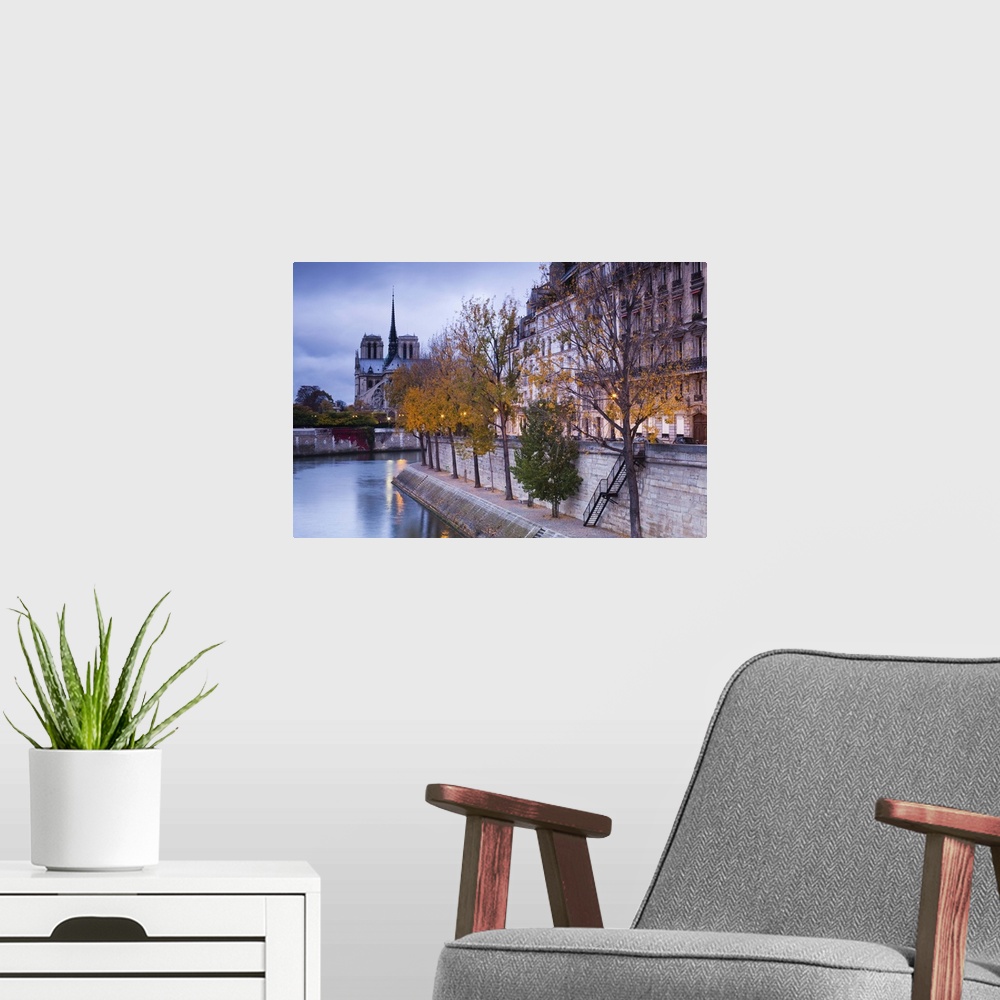 A modern room featuring France, Paris, Cathedral Notre Dame cathedral and Ile St-Louis, dawn