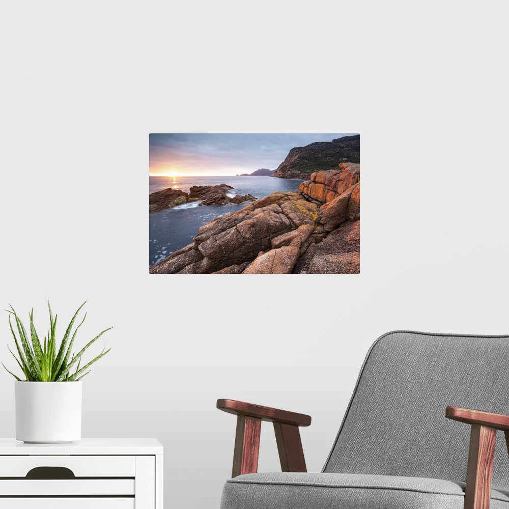 A modern room featuring Freycinet National Park, Tasmania, Australia. Sunrise over the coastline