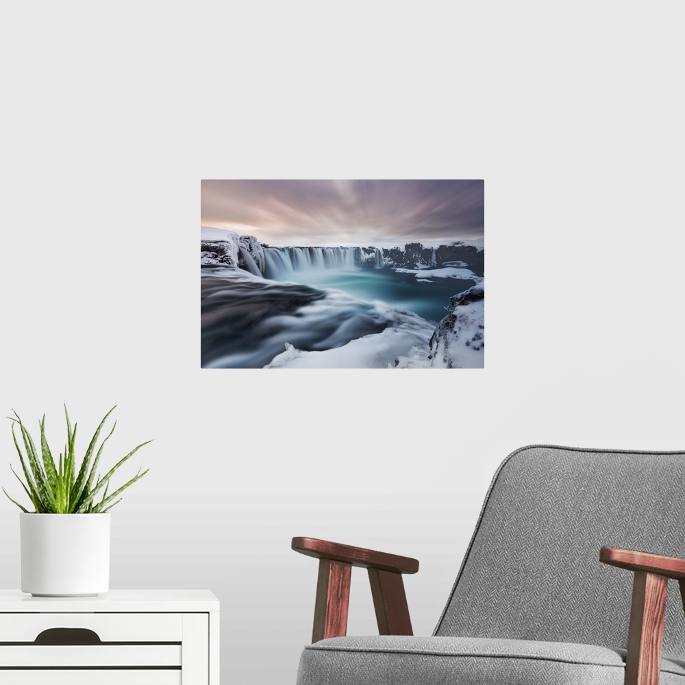 A modern room featuring Godafoss waterfall at sunset during winter time, Akureiry, Iceland. Western Europe, Iceland.