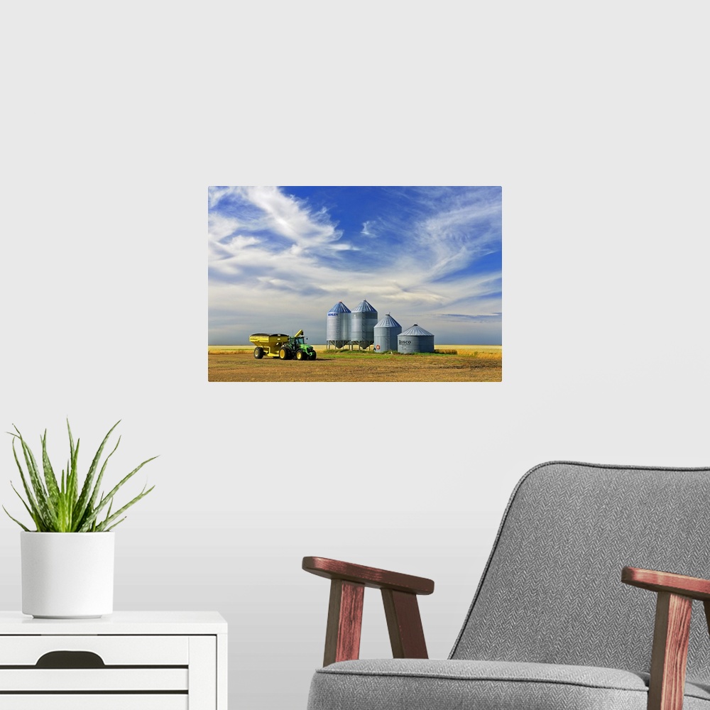A modern room featuring Grain Bins And Cart In Lentil Field, Lang, Saskatchewan, Canada