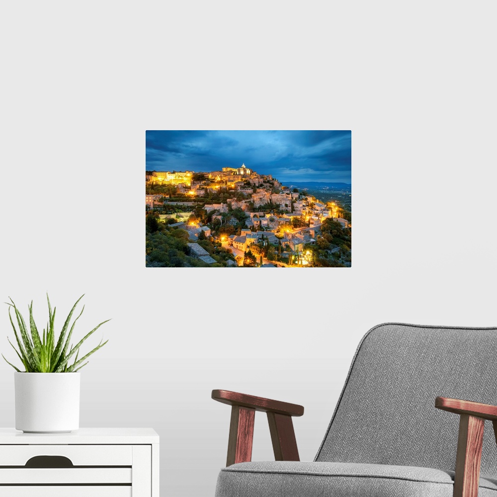 A modern room featuring Hilltop town of Gordes at dusk, Vaucluse, Provence-Alpes-Cote d'Azur, France.