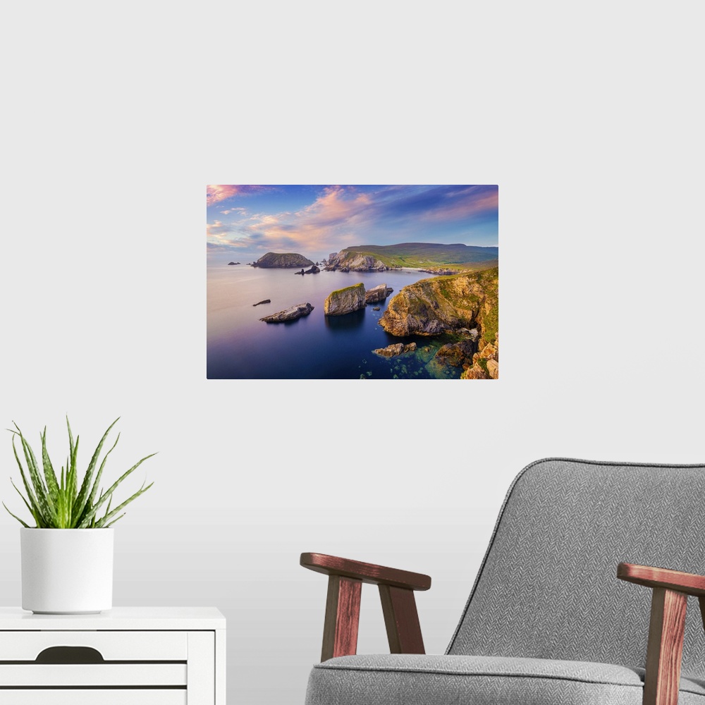 A modern room featuring Ireland, Co.Donegal, Port (An Port), Rocky coastline at dusk.