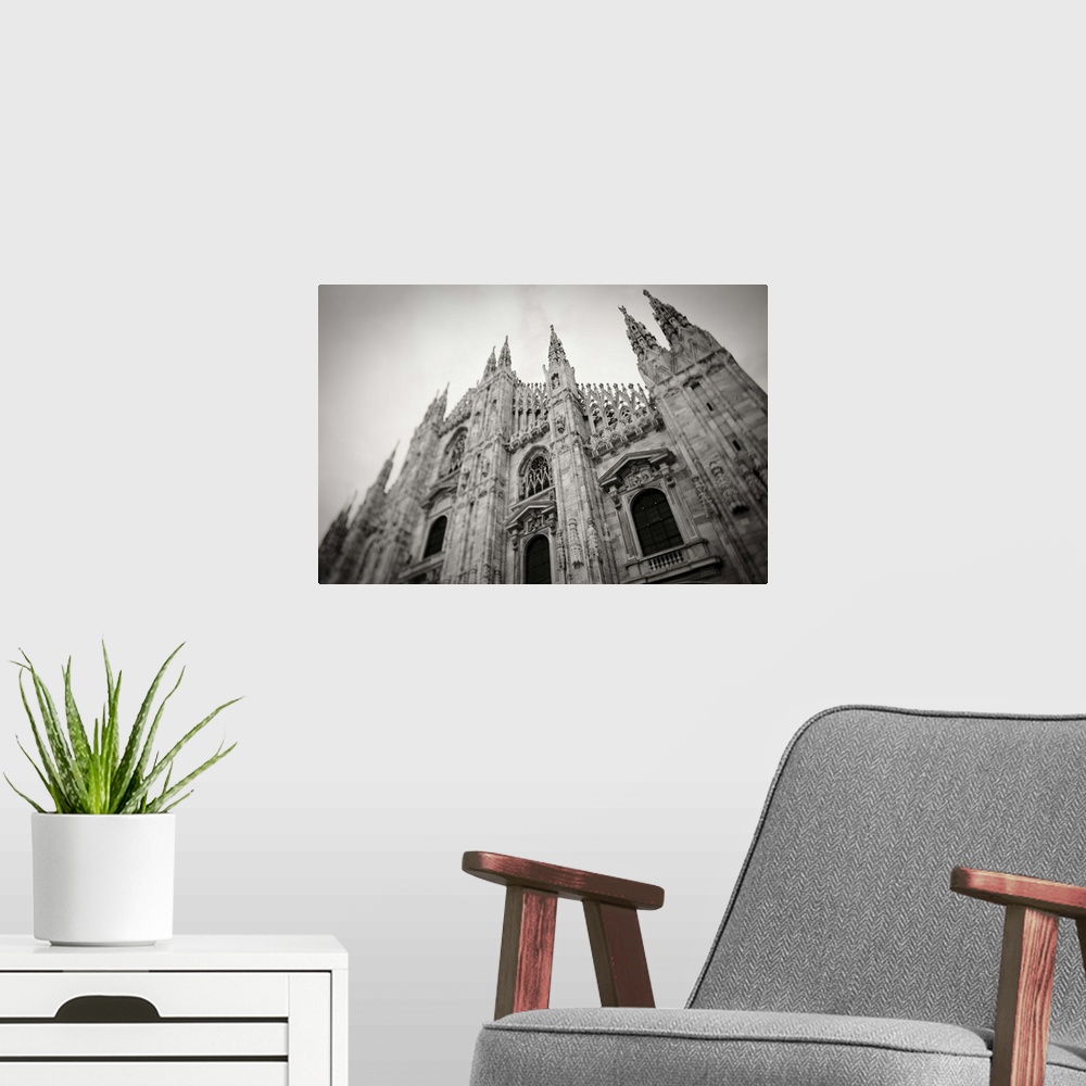 A modern room featuring Italy, Lombardy, Milan, Piazza Duomo, Duomo cathedral, defocussed