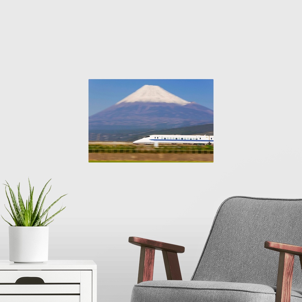 A modern room featuring Japan, Houshu, Shinkansen (Bullet train) which reaches speeds of up to 300km/h passing Mount Fuji...