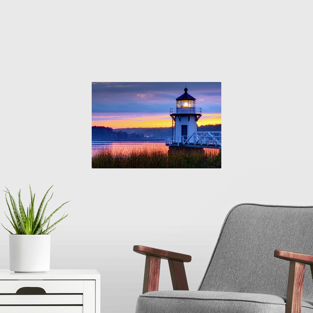 A modern room featuring USA. Maine. Doubling Point Light.