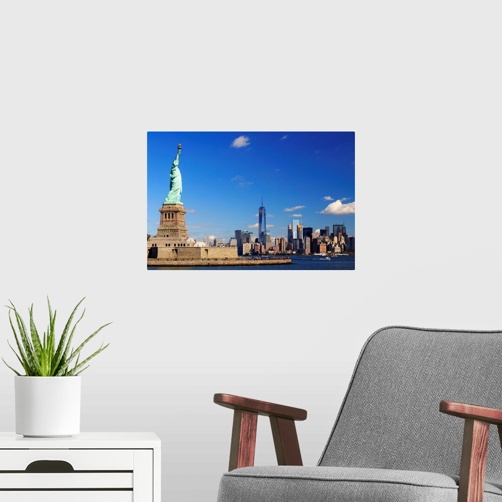 A modern room featuring USA, New York, New York City, Statue of Liberty and Lower Manhattan Skyline.