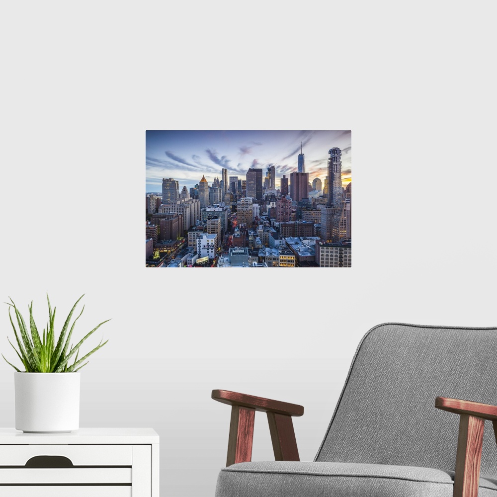 A modern room featuring USA, New York, New York City, Lower Manhattan, elevated view, dusk