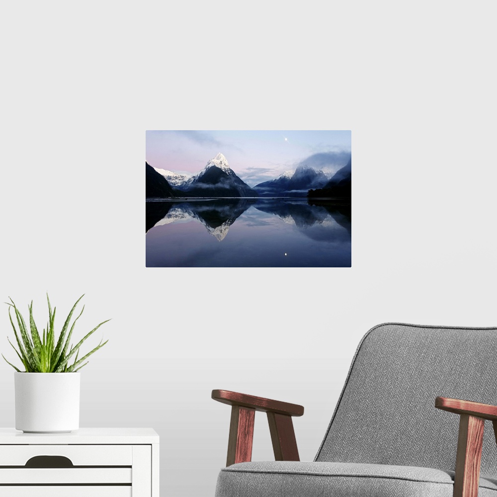 A modern room featuring New Zealand, Nuova Zelanda, Fiordland, Milford Sound and moon during a cold and misty sunrise.
