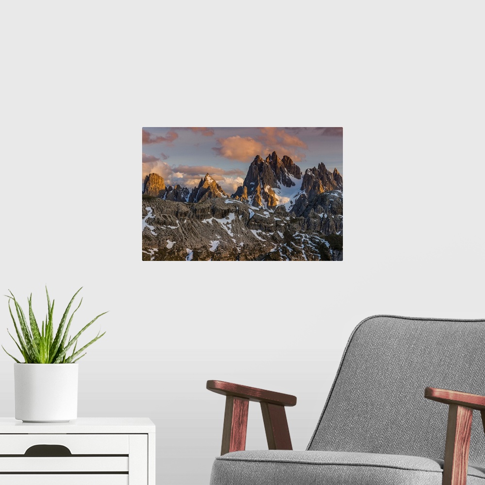 A modern room featuring Panoramic view over the Sorapis mountain group at sunset, Dolomites, Veneto, Italy