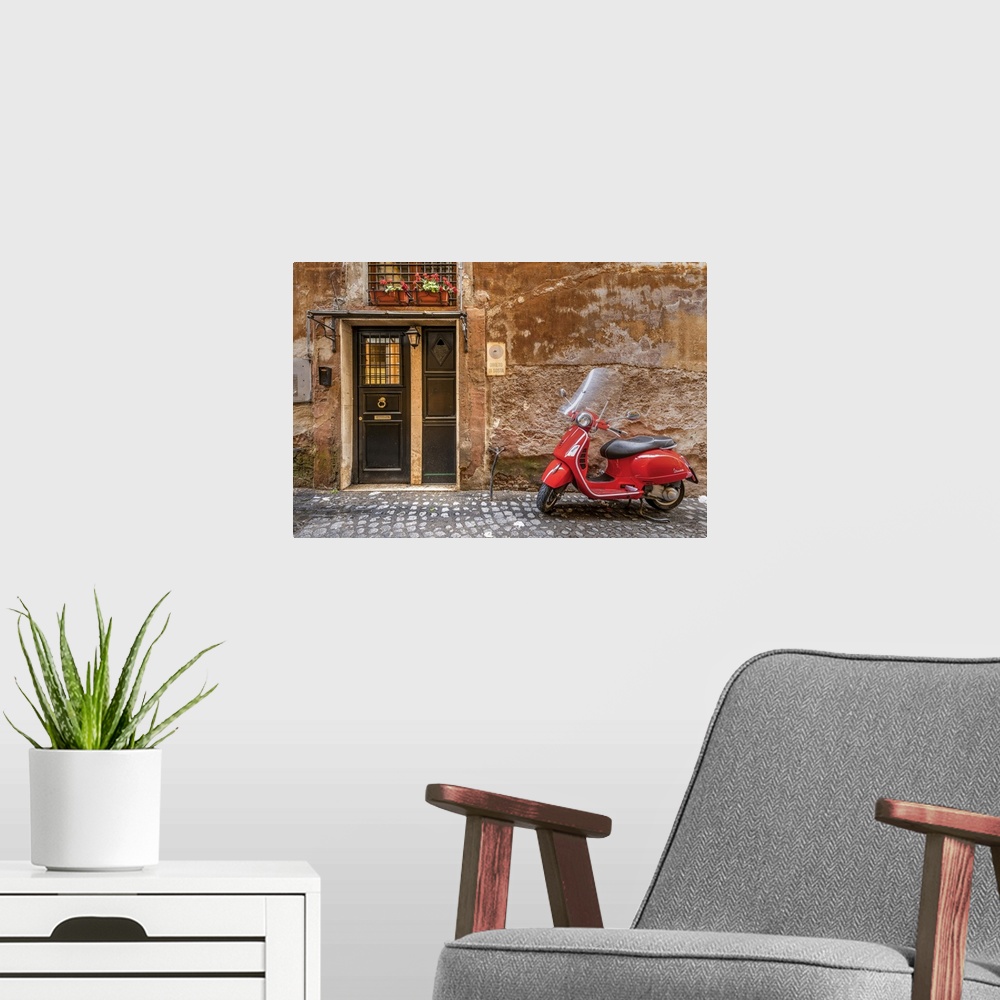A modern room featuring Parked red Vespa scooter in a cobbled street of Rome, Lazio, Italy