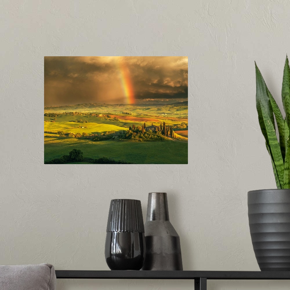 A modern room featuring Podere Belvedere after a storm with rainbow, Val d'Orcia, Tuscany, Italy