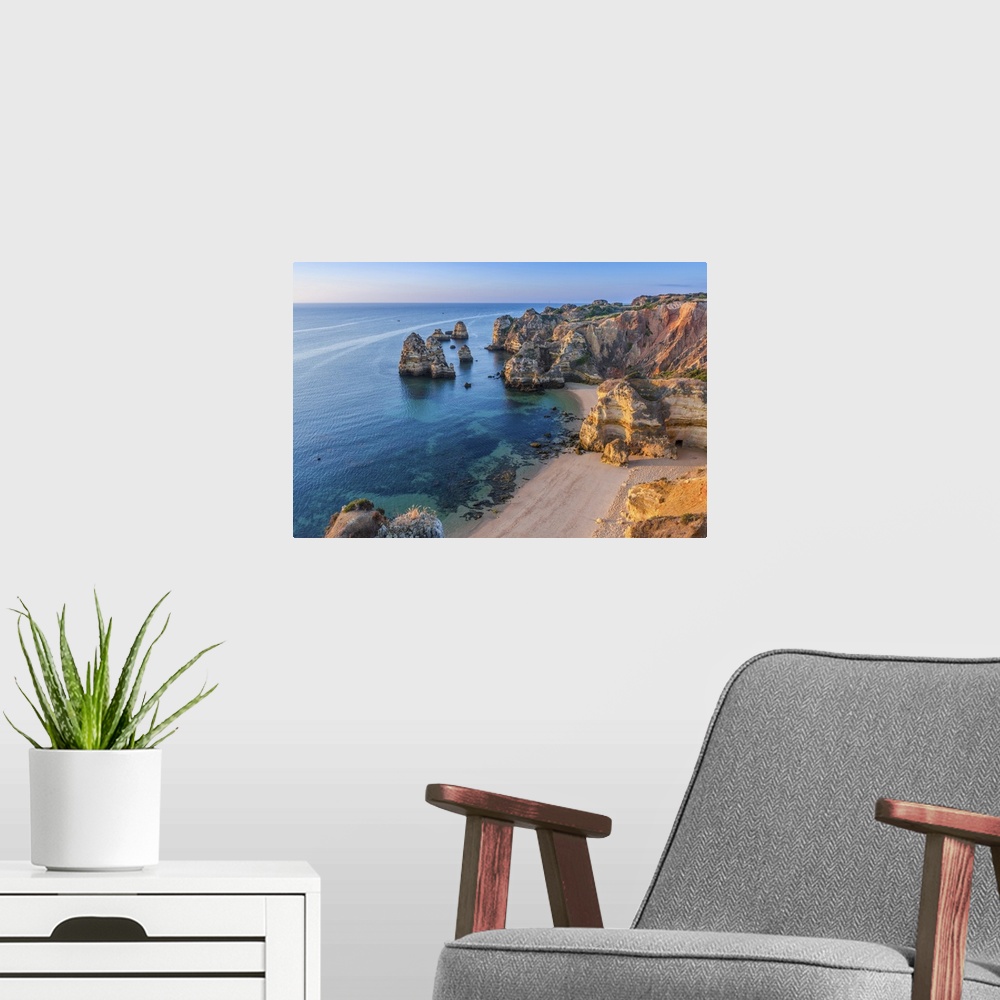 A modern room featuring Portugal, Algarve, Lagos, overlooking Camilo Beach (Praia do Camilo)