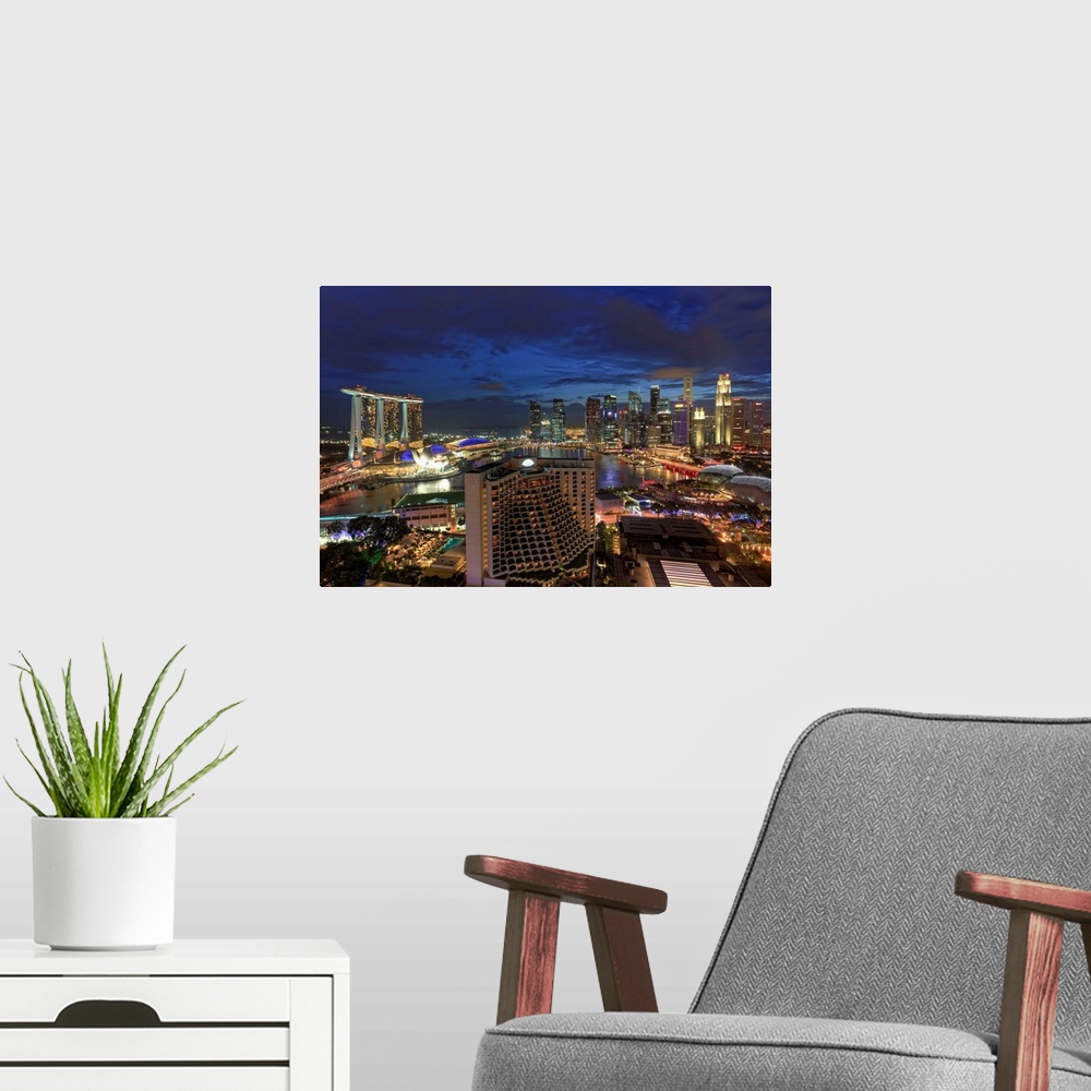 A modern room featuring Singapore, Aerial view of Singapore Skyline and Esplanade Theathre