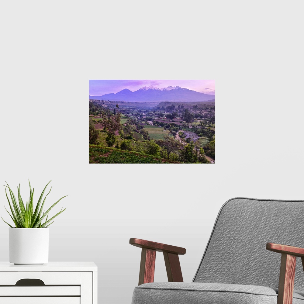 A modern room featuring South America, Peru, Arequipa, andes mountains at dawn.