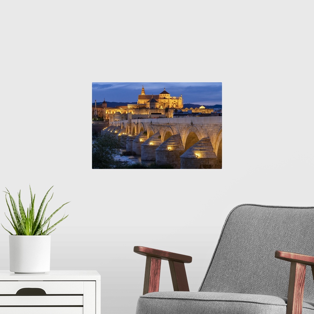 A modern room featuring Spain, Andalusia, Cordoba, Roman Bridge over Guadalquivir river,.