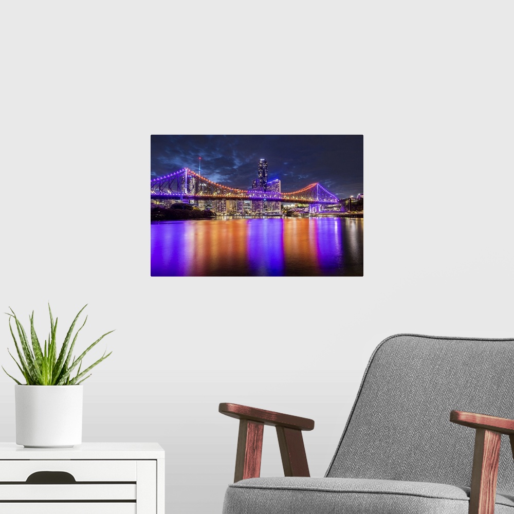 A modern room featuring Story Bridge and Brisbane River at dusk, Brisbane, Queensland, Australia.