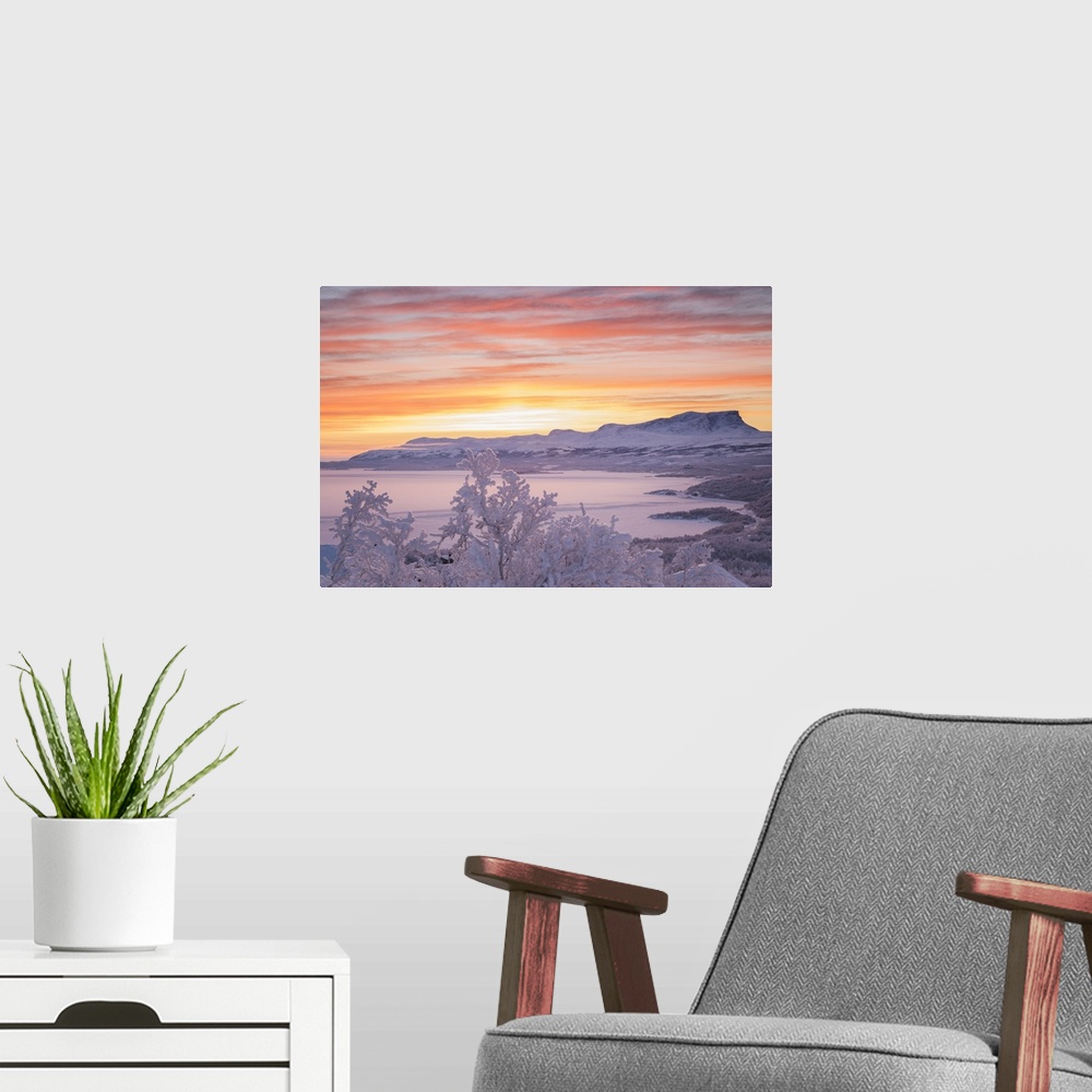 A modern room featuring Sunrise with burning sky, Abisko, Kiruna, Sweden, Europe