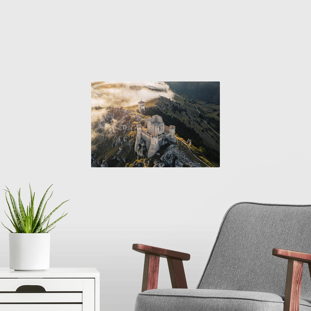 A modern room featuring Sunset in Rocca Calascio, an ancient building on the top of a mountain, Gran Sasso National Park,...