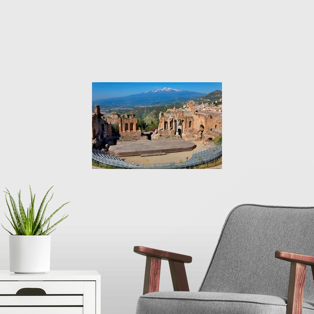 A modern room featuring The Greek theatre and Mount Etna, Taormina, Sicily, Italy