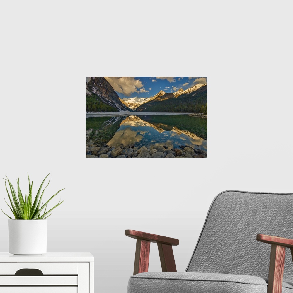 A modern room featuring Victoria Glacier on Mt. Victoria at Lake Louise. On the left is Fairview Mountain. On the right i...
