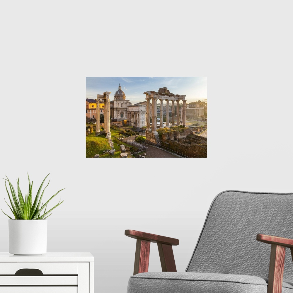 A modern room featuring View of the ruins of Fori Imperiali from the Campidoglio at dawn. Rome, Rome district, Lazio, Italy.
