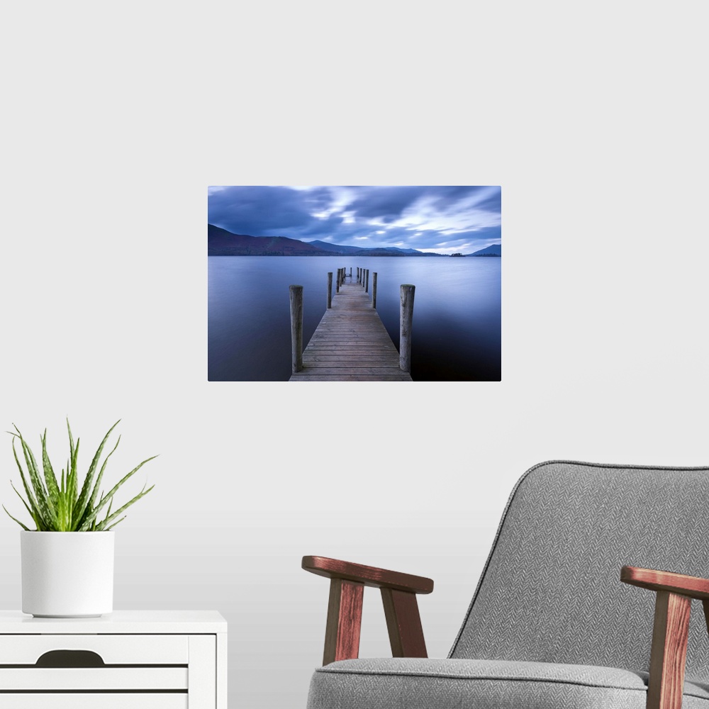 A modern room featuring Wooden jetty on Derwent Water in the Lake District, Cumbria, England. Autumn