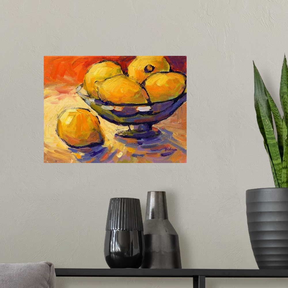 A modern room featuring A contemporary abstract painting of a bowl of lemons against a red background.