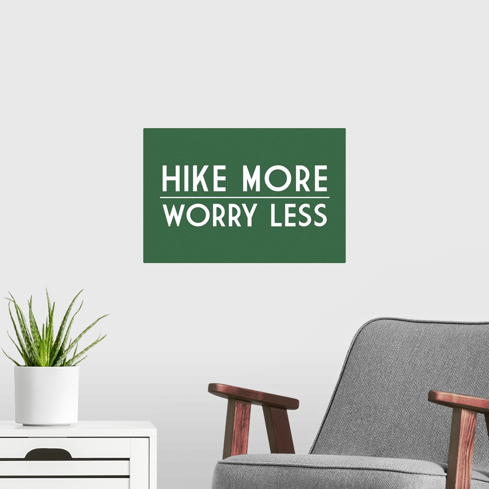A modern room featuring Hike More, Worry Less