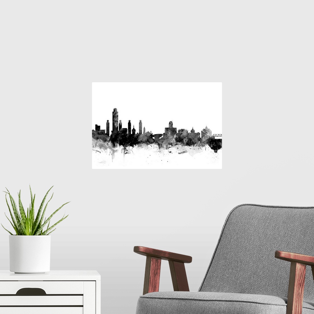 A modern room featuring Contemporary artwork of the Albany city skyline in black watercolor paint splashes.