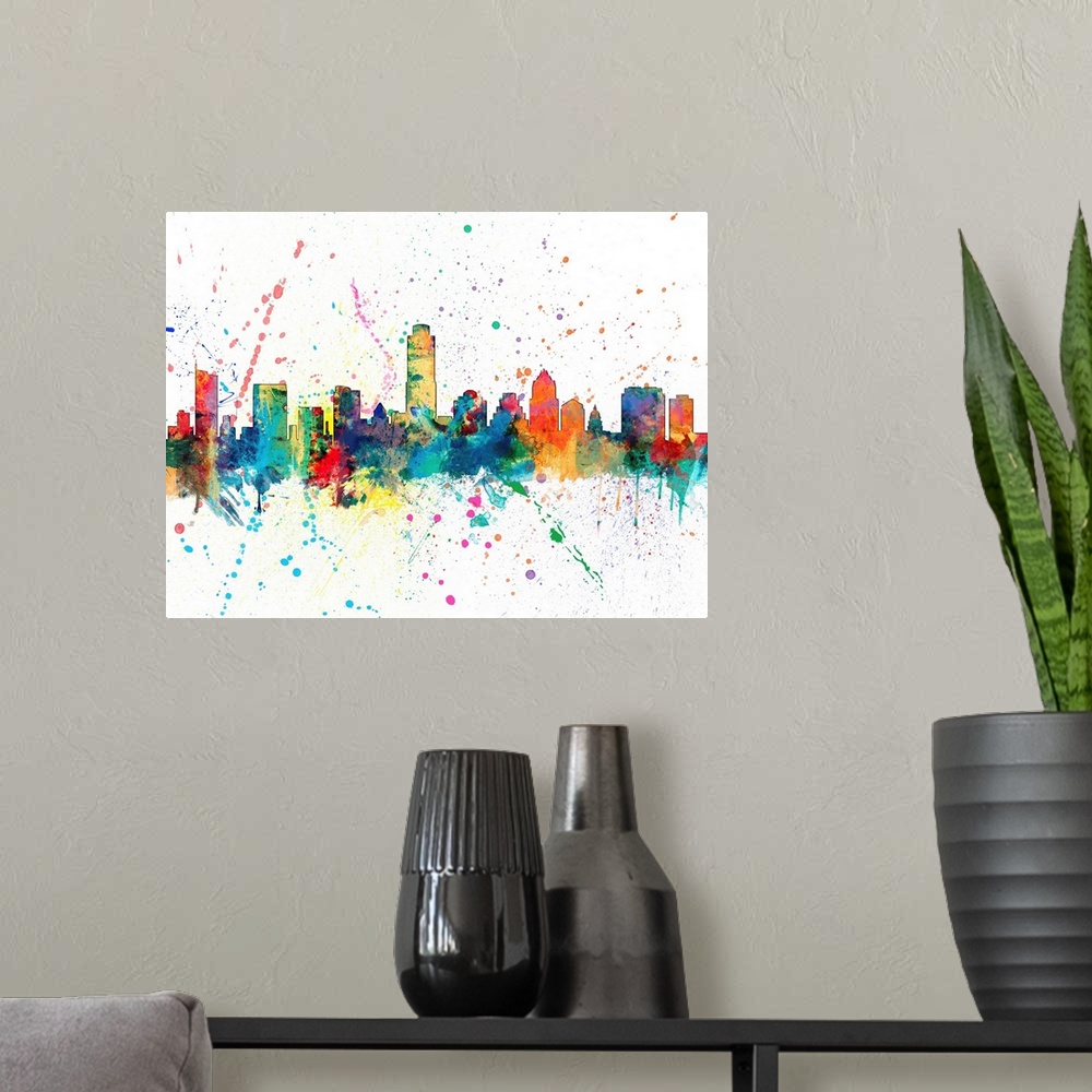 A modern room featuring Wild and vibrant paint splatter silhouette of the Austin skyline.