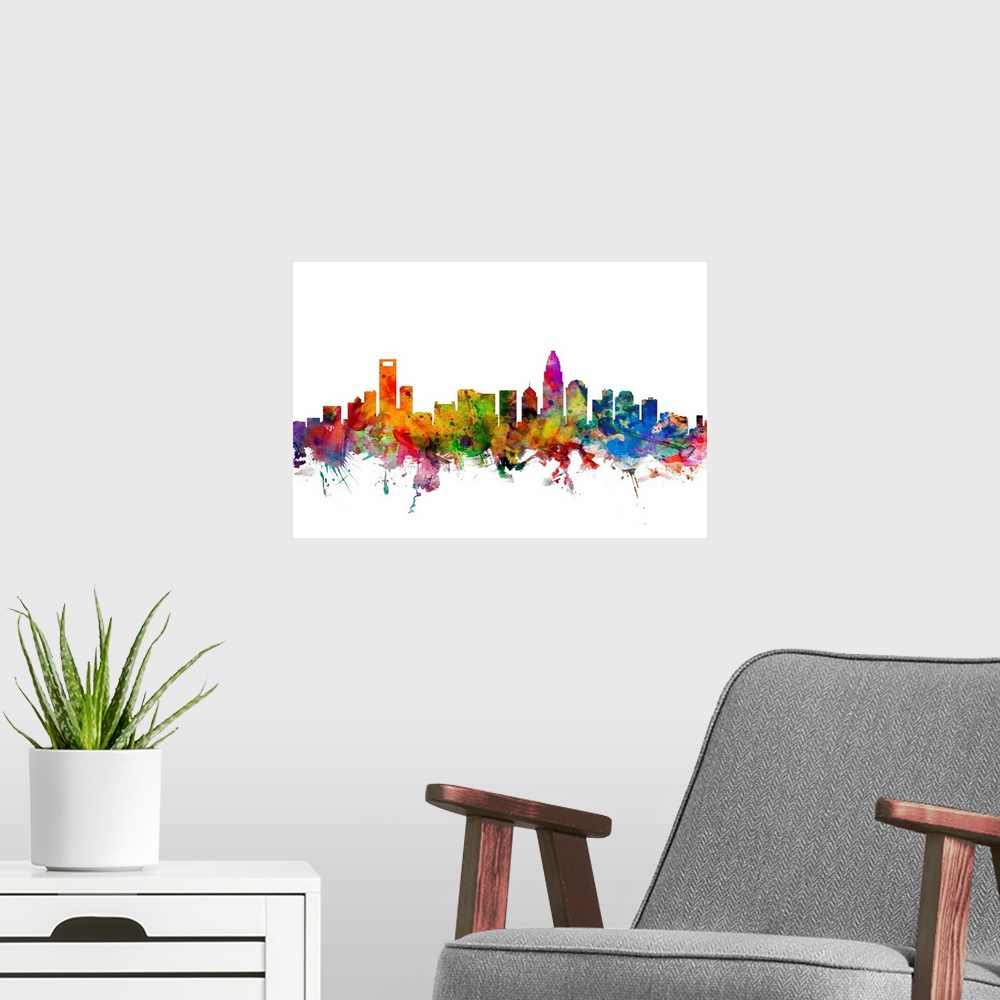 A modern room featuring Watercolor artwork of the Charlotte skyline against a white background.