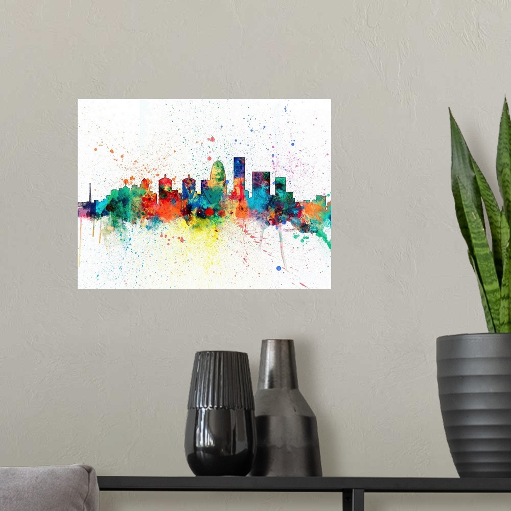 A modern room featuring Wild and vibrant paint splatter silhouette of the Louisville skyline.