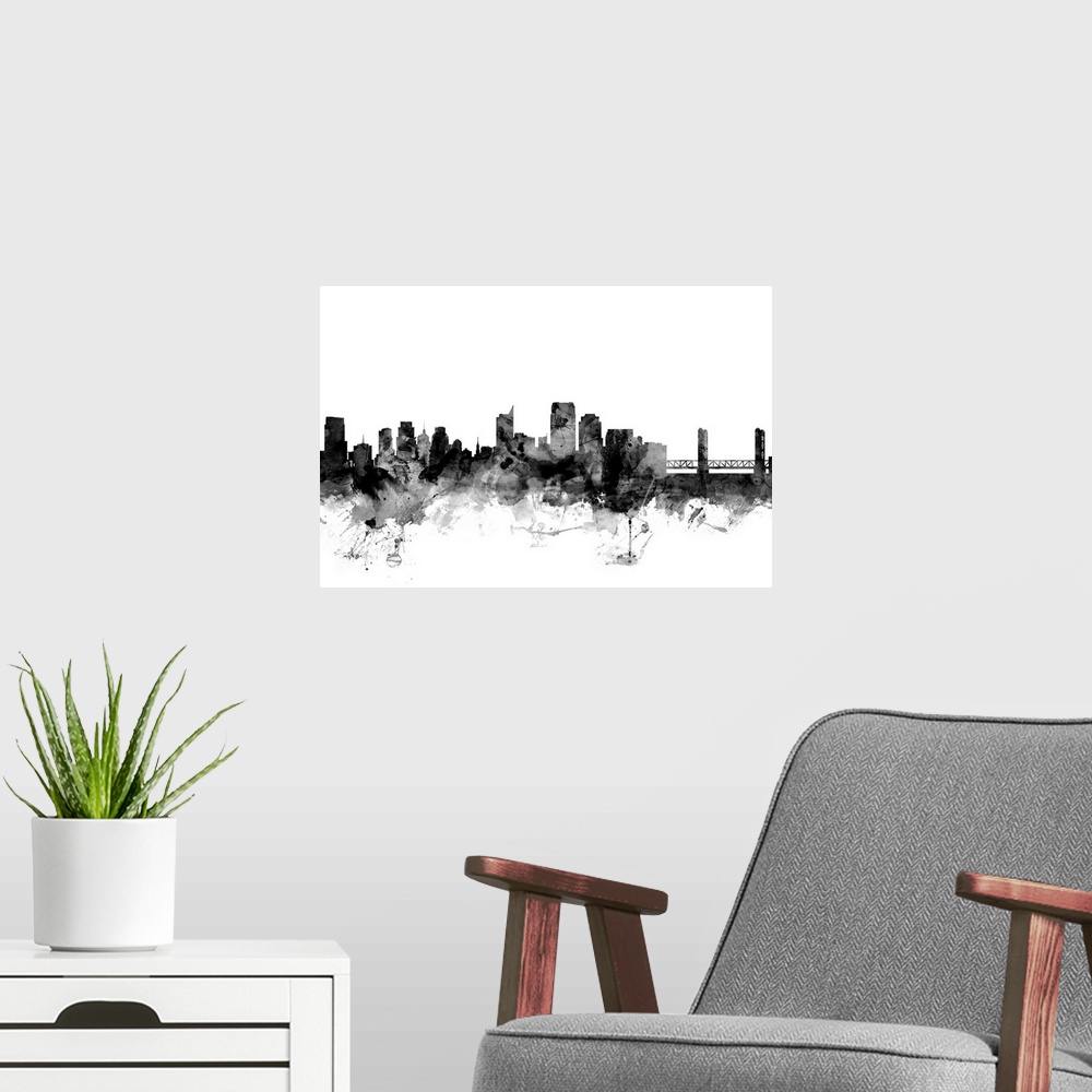 A modern room featuring Contemporary artwork of the Sacramento city skyline in black watercolor paint splashes.