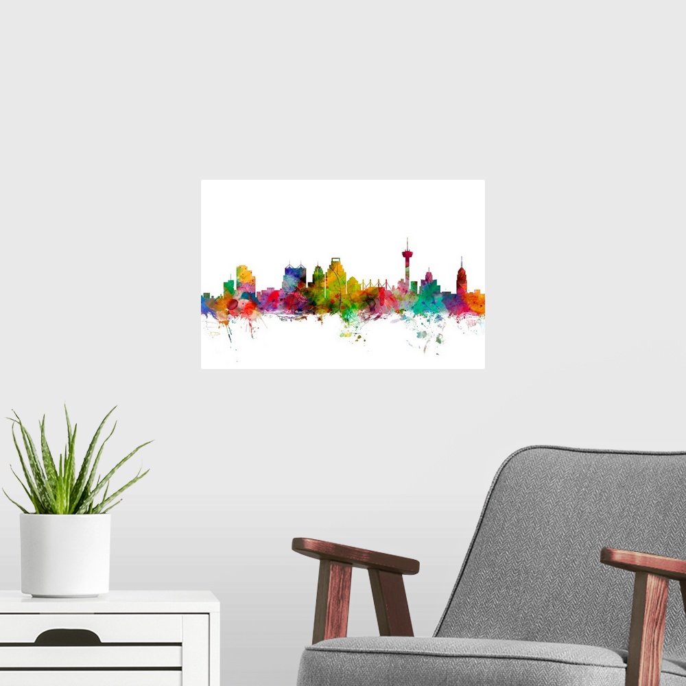 A modern room featuring Watercolor artwork of the San Antonio skyline against a white background.