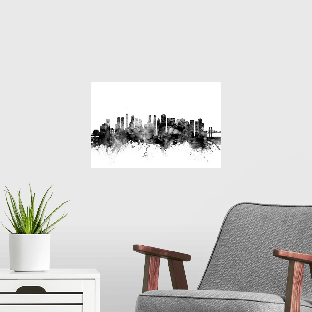 A modern room featuring Contemporary artwork of the Tokyo city skyline in black watercolor paint splashes.