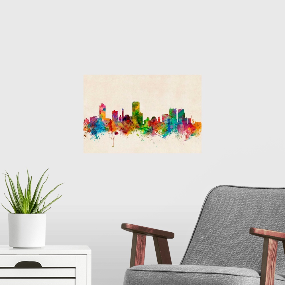 A modern room featuring Contemporary piece of artwork of the Wellington, New Zealand skyline made of colorful paint splas...