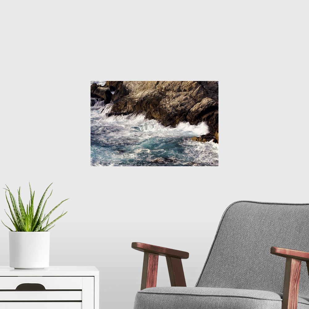 A modern room featuring Waves crash into a rock formation at Point Lobos State Park, just south of the Monterey Peninsula...