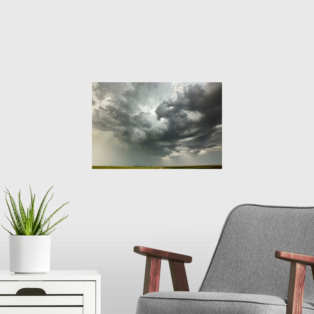 A modern room featuring Sunset Storm clouds Billowing Over Prairie North Dakota