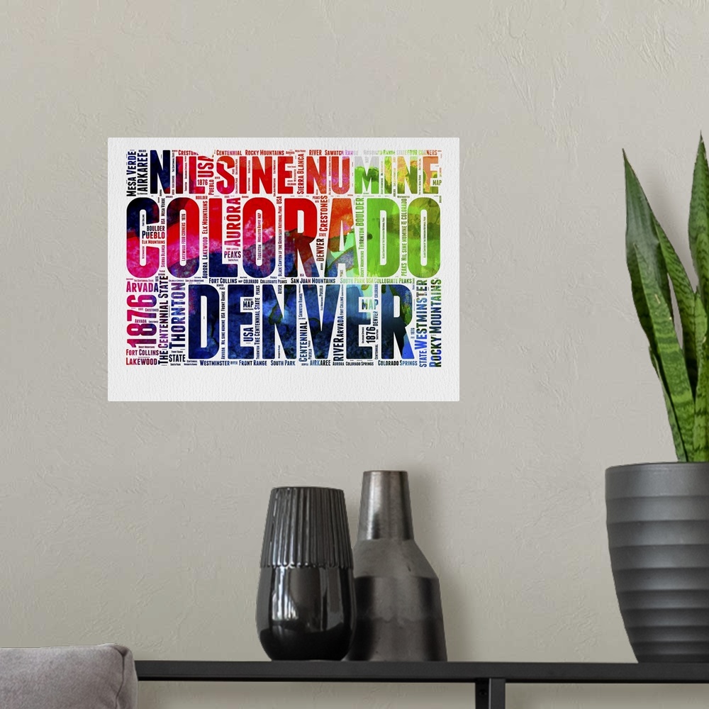A modern room featuring Watercolor typography art map of the US state Colorado.
