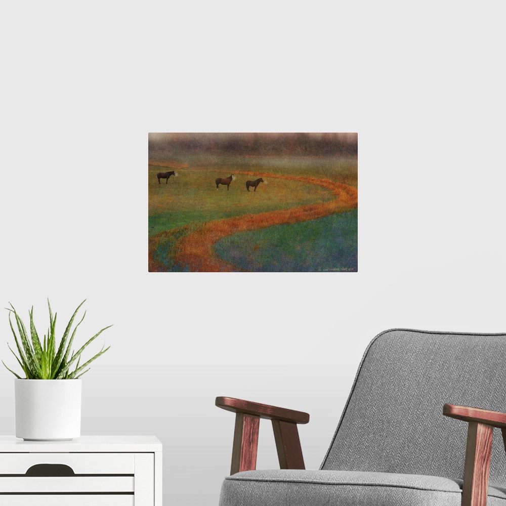 A modern room featuring Contemporary artwork of three horses standing in a misty field.