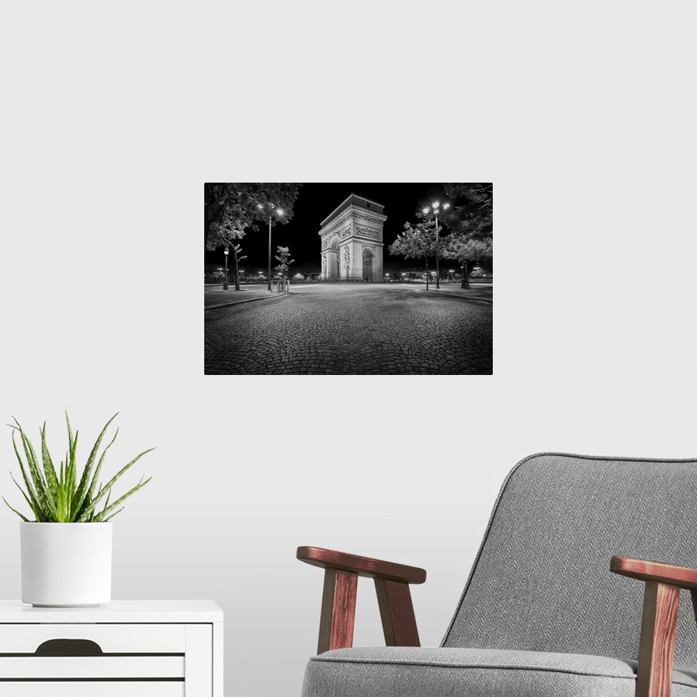 A modern room featuring Fine art photo of the Arc de Triomphe, a landmark on the Champs Elysees in Paris.
