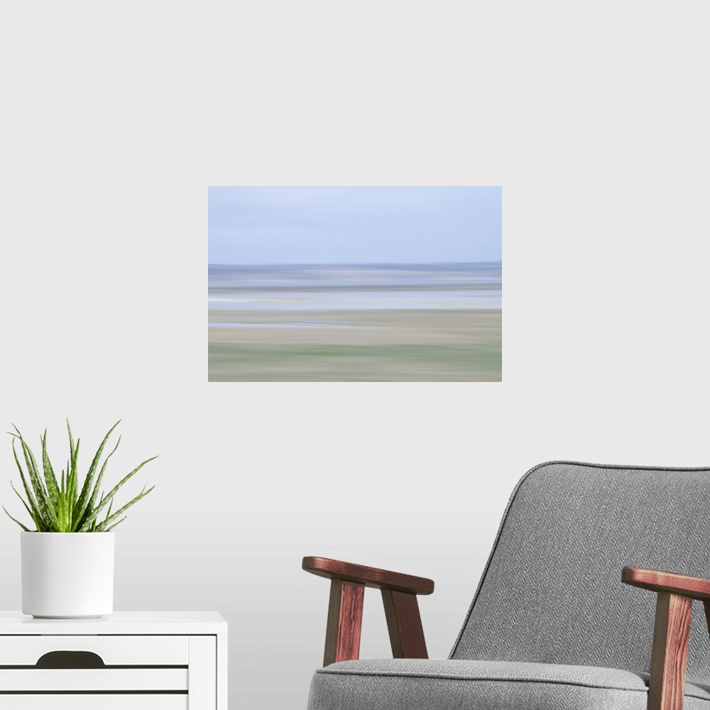A modern room featuring Artistically blurred photo. Early morning view of nature reserve Agger Tange, south of the town o...