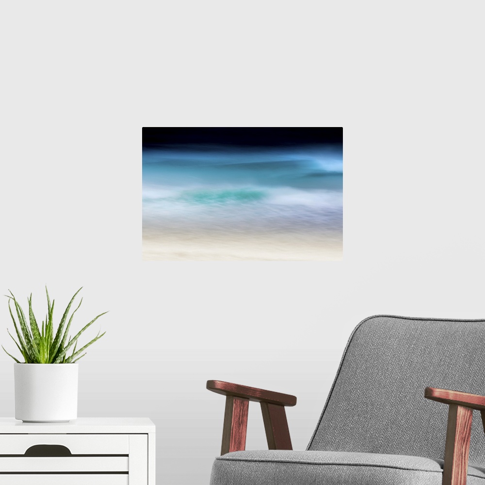 A modern room featuring Abstract seascape of teal waves breaking over soft sand with moody sky.