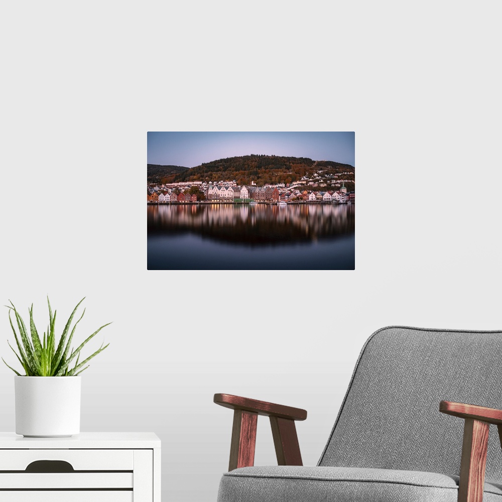 A modern room featuring Long exposure of the evening harbor of Bergen, namely the city of seven mountains in Norway, with...