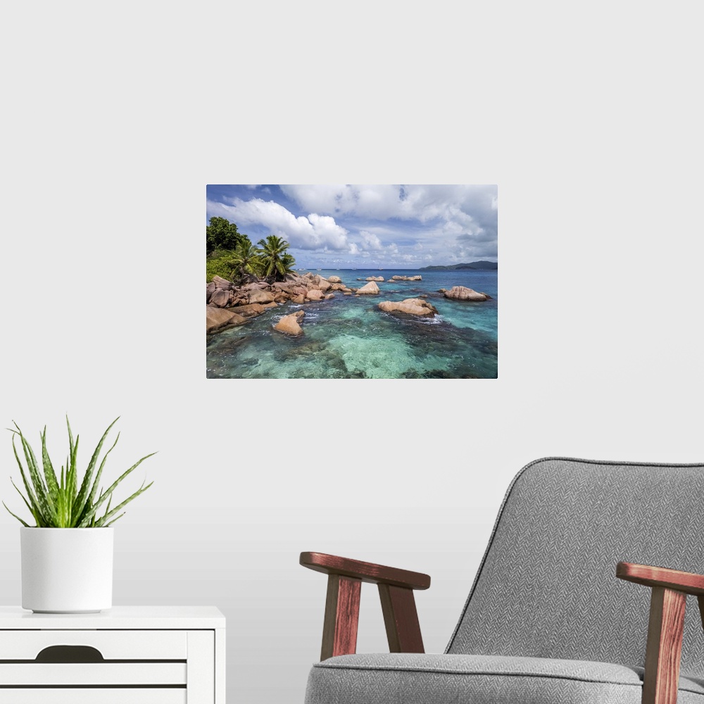 A modern room featuring An aerial image of La Digue, a small island in the Seychelles archipelago. From above you can cle...